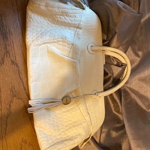 Gently used furla bag , few discoloration that can be fixed